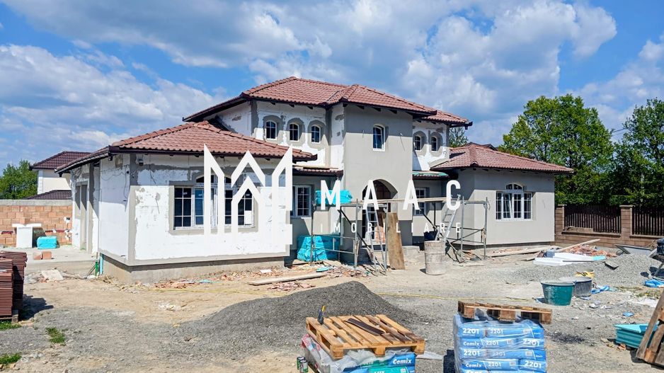 Casa stil mediteranian 4 dormitoare 800 mp teren Tocile Sibiu - Poză 1