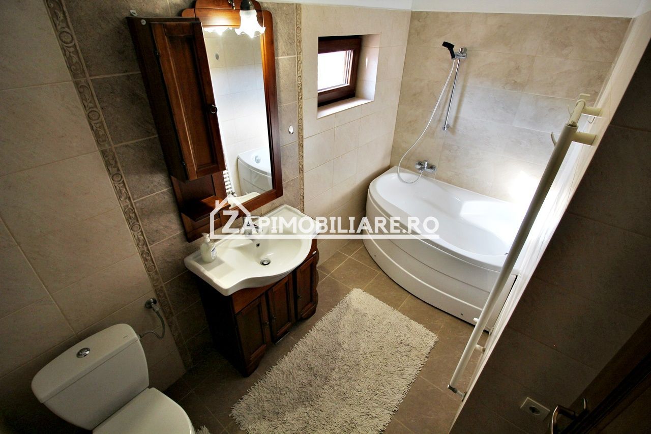 Casa 3 camere, 2 bai,1 garaj,teren 360 mp.zona Dambu Pietros - Poză 7