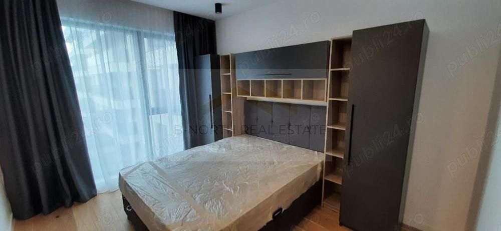 Apartament de închiriat 2 camere Nusco City Pipera | Vedere către grădina - Poză 2