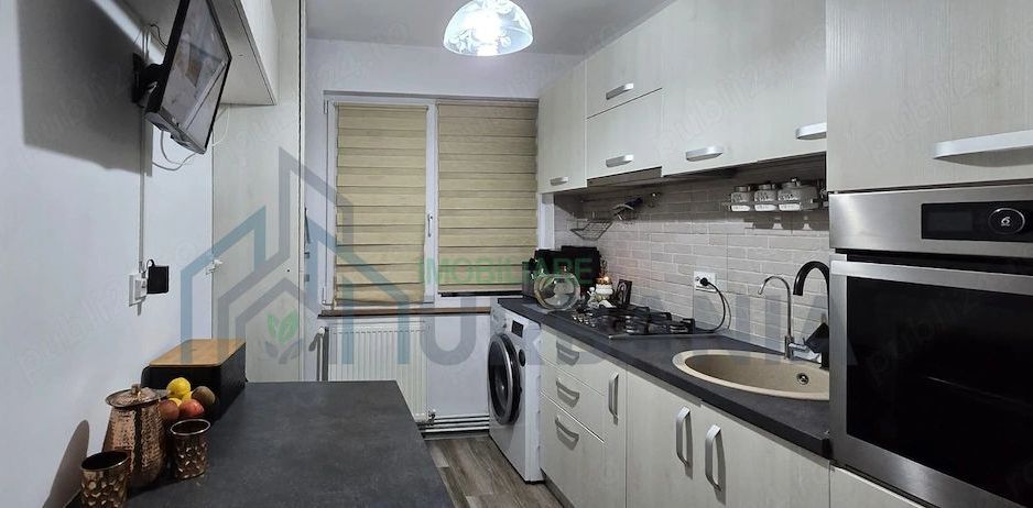 Apartament modern, 2 camere, renovat integral, în centrul orașului Pașcani - Poză 3