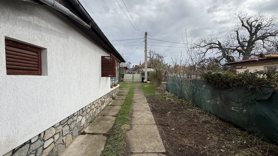 Casă corp C1 84mp + casă corp C2 51mp+garaj+ grădină și teren 889mp - Poză 29