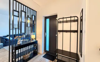 Casa moderna si cocheta. Locatie excelenta. Curte amenajata. Loc de parcare. - Poză 12
