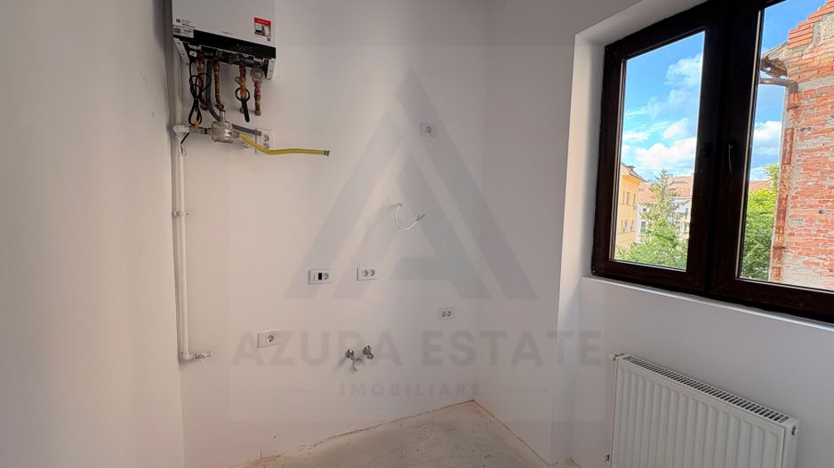 Garsonieră renovata 35 mp etaj 1 dispune de  pivnita in zona Centrala - Poză 5
