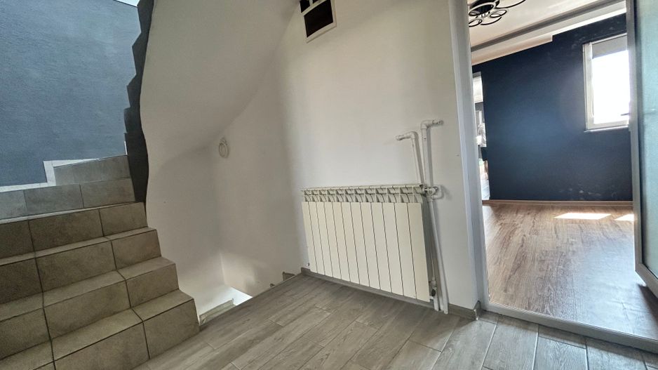 Casă P+1E cu terasă circulabilă, garaj amenajat și finisaje moderne - Poză 18