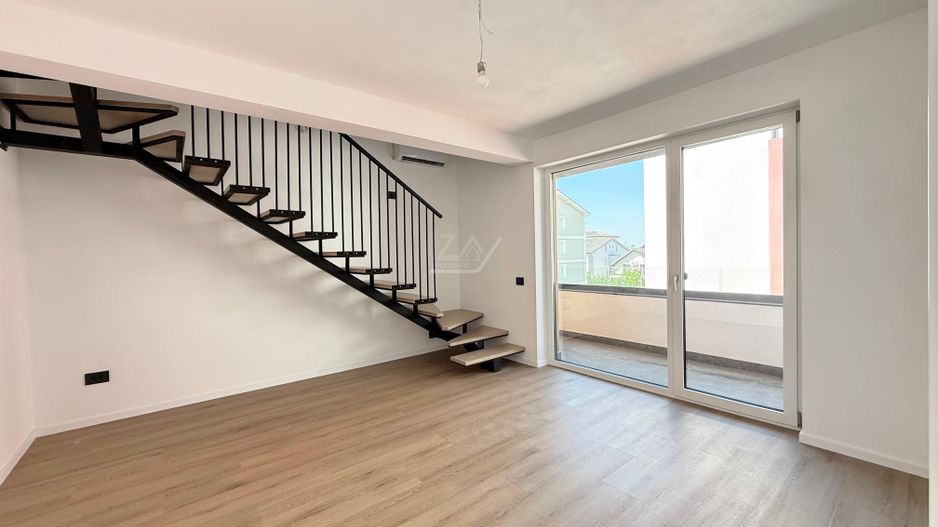 Ap pe 2 niveluri. Bucatarie inchisa, 2 bai. 2 locuri de parcare. - Poză 1