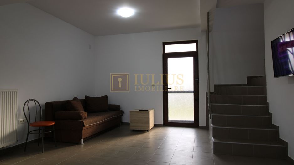 2 dormitoare, 80 mp utili, gradina si curte proprie de 300mp. - Poză 4