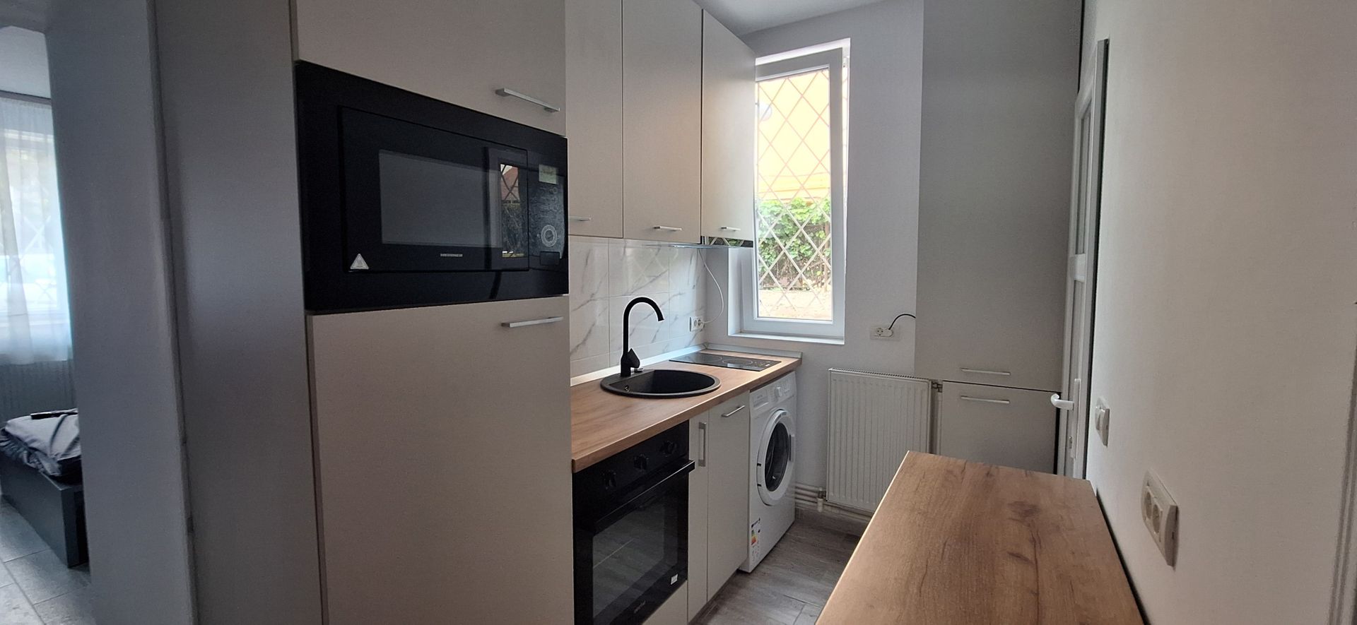 Apartament central cu o camera si loc de parcare - Poză 6