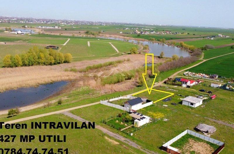Teren INTRAVILAN in zona lacului - comuna Berceni - Poză 1