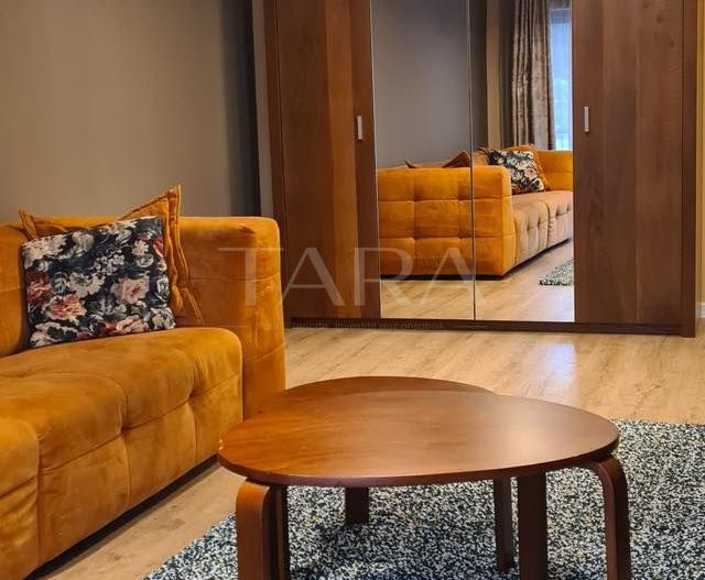 Apartament cu curte privată în imobil nou, Borhanci - Poză 2