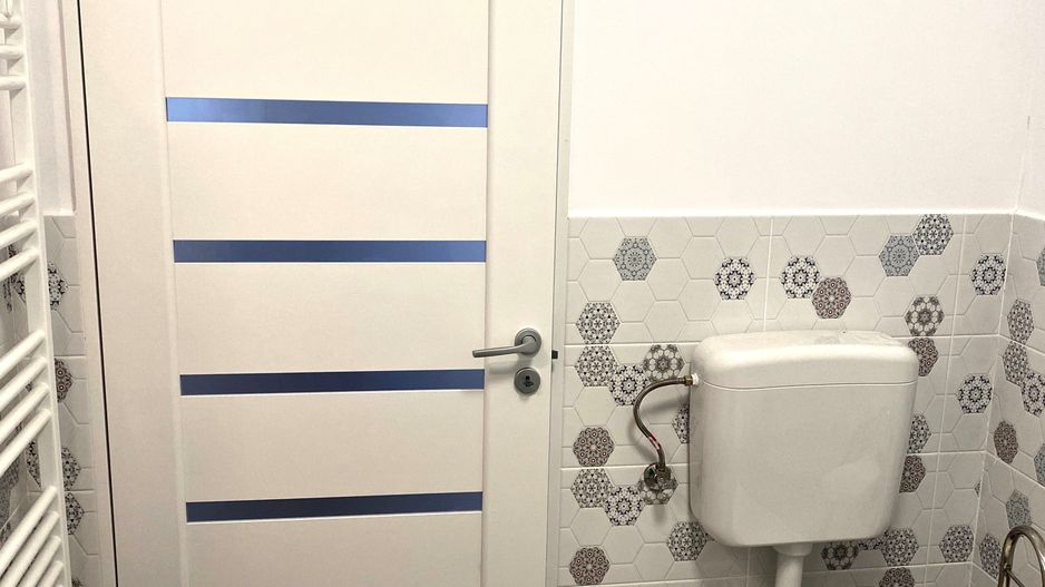 Casa de inchiriat central - Poză 9