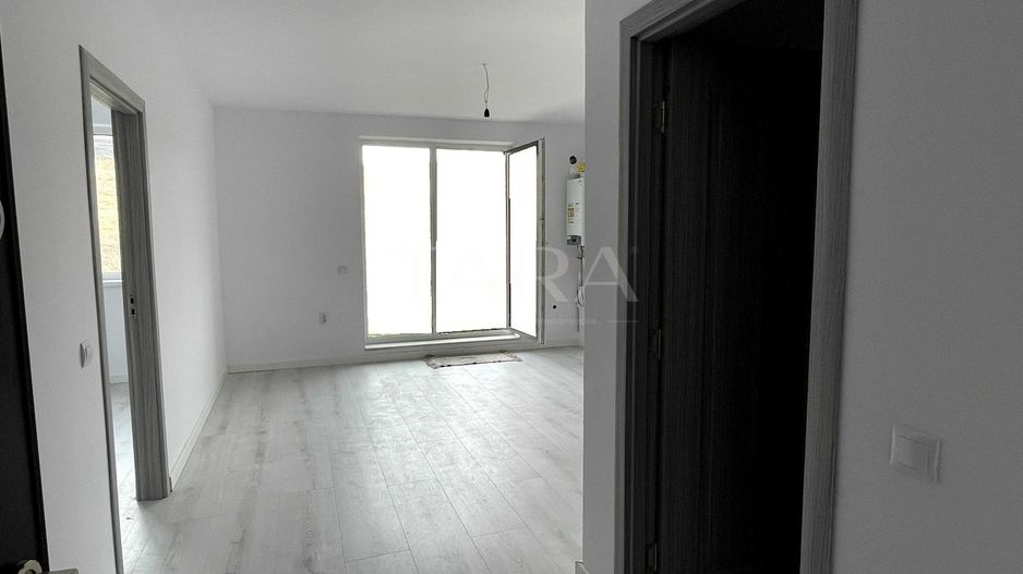 Apartament modern cu 2 camere, grădină proprie, zona Chinteni - Poză 2