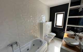 CASA SPATIOASA  CU GARAJ SI TEREN DE 600 MP - Poză 12