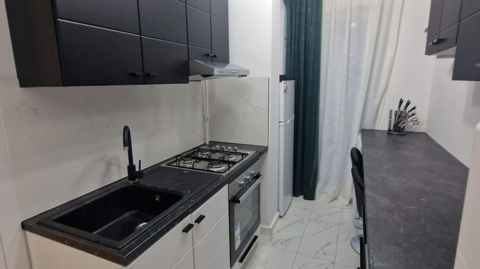 Garsonieră modernă cu grădină proprie în Cosmopolis – investitie - Poză 5