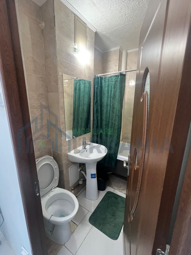 Ofer spre închiriere apartament Tătărași, la bulevard, utilat complet - Poză 5