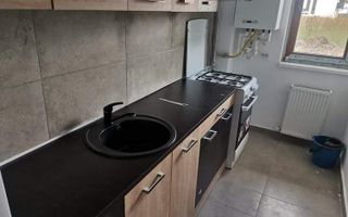 închiriez apartament cu o camera - Poză 10