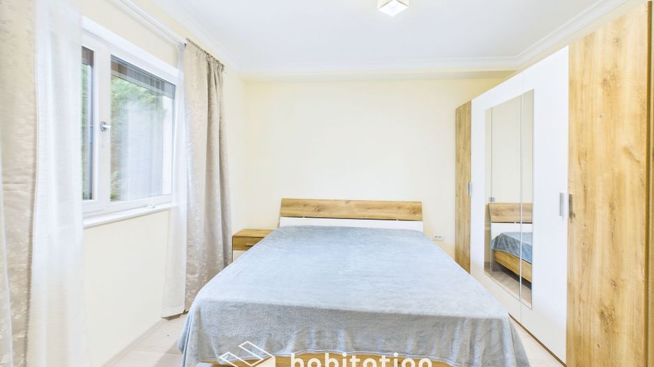 Apartament spațios cu curte și garaj – confortul unei case moderne - Poză 13