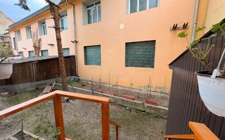 Apartament decomandat 70 mp utili 2 bai pivnita si curte 58 mp Central - Poză 17