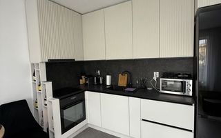 Apartament cu 2 camere, ultarfinisat, mobilat, cu grădină proprie. - Poză 3