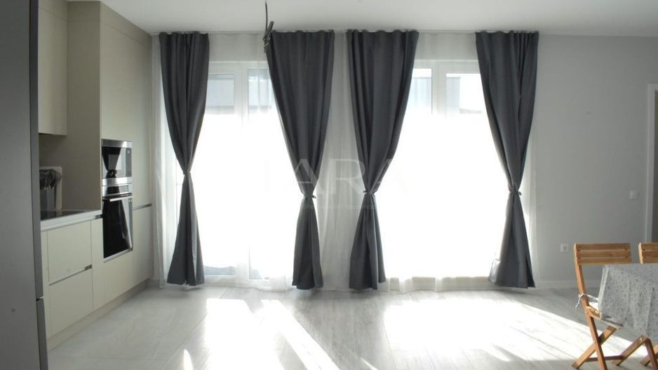 Apartament cu 3 camere, 2 băi, 2 logii și parcare subterană. - Poză 1