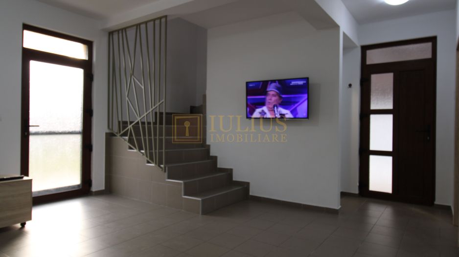 2 dormitoare, 80 mp utili, gradina si curte proprie de 300mp. - Poză 3