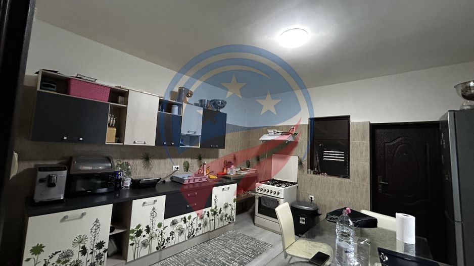 Casă spațioasă P+1+M pe teren de 902 mp – ideală pentru familie - Poză 3