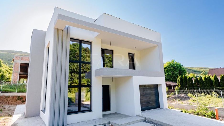 Casă cu arhitectura contemporana, terasă panoramică, zona verde. - Poză 1