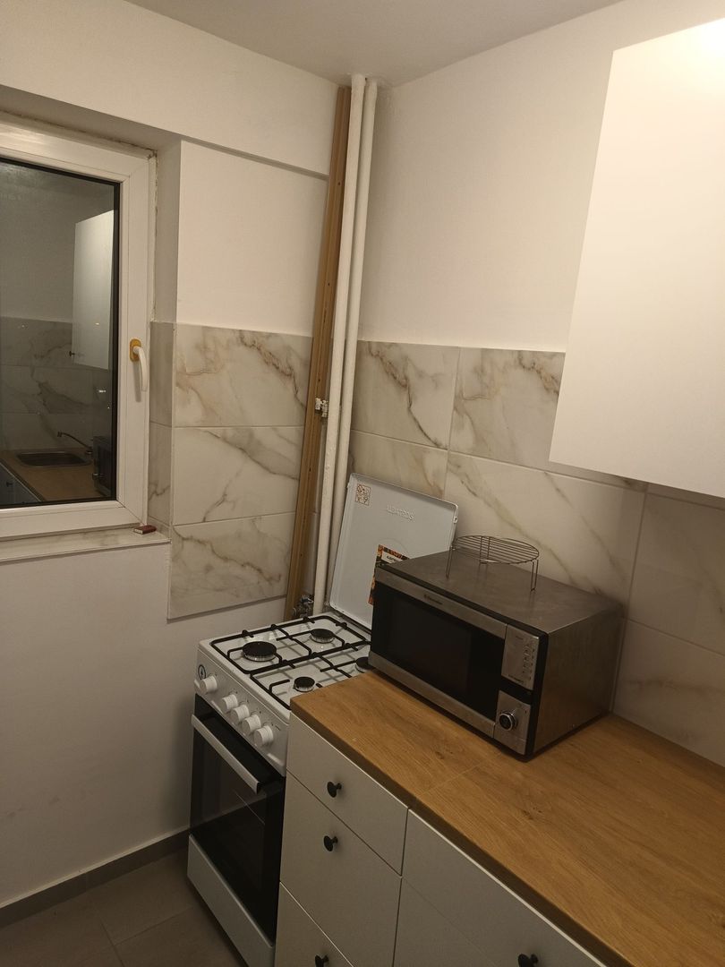 Garsonieră Titan, parter cu balcon, mobilată complet, prima închiriere - Poză 6