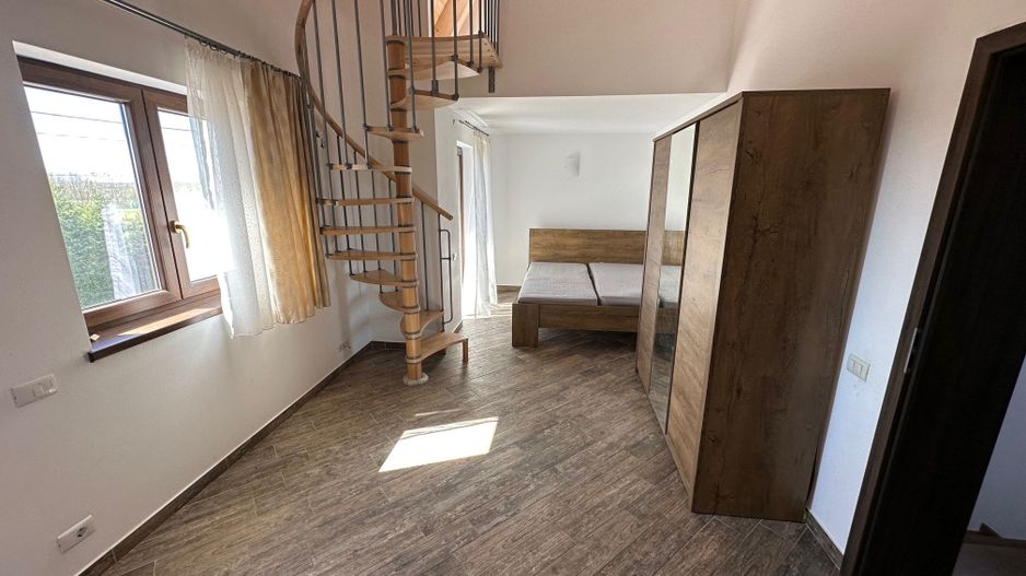 CASA SPATIOASA  CU GARAJ SI TEREN DE 600 MP - Poză 17