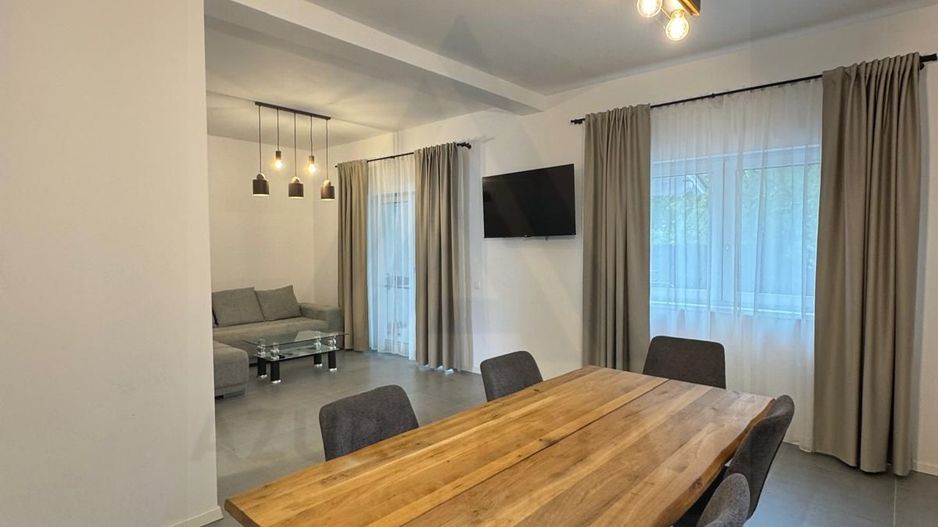 Casa individuala 114 utili 4 camere 2 bai si curte 215 mp in Selimbar - Poză 1