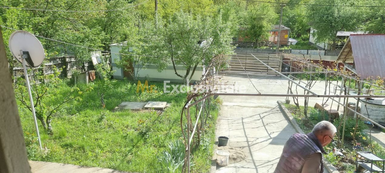 Casă P+M cu 1.558 mp teren, livadă și garaj - Poză 23