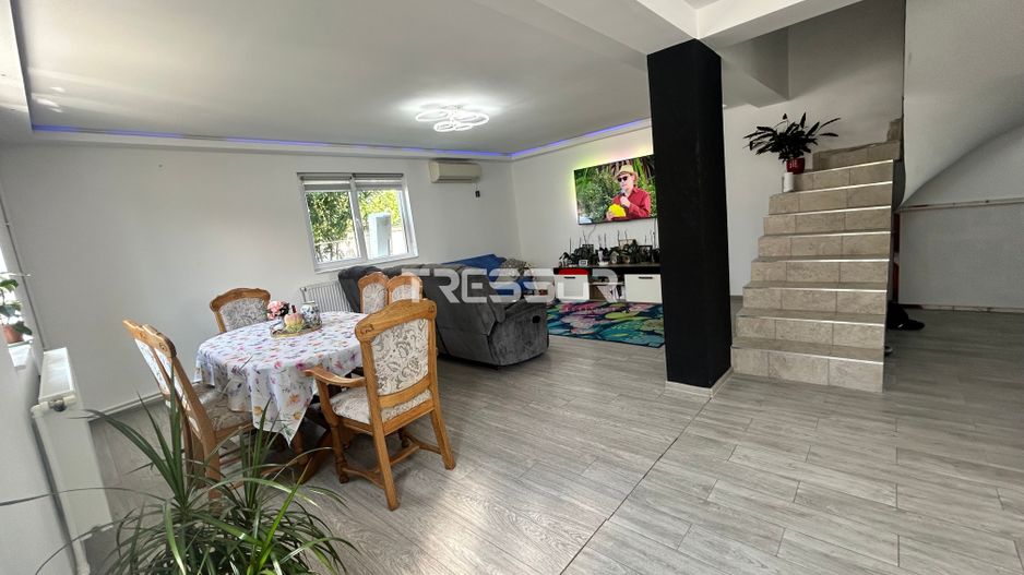 Casă P+1E cu terasă circulabilă, garaj amenajat și finisaje moderne - Poză 6