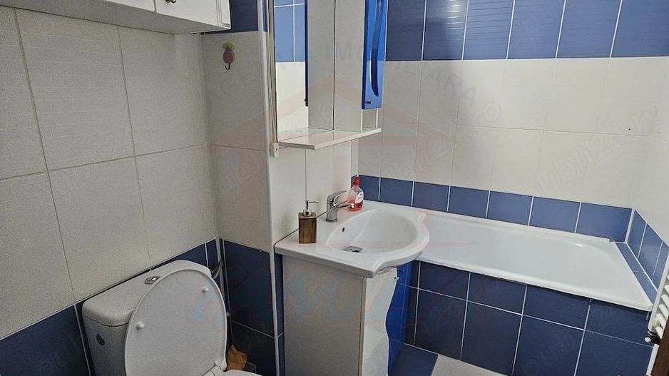 De închiriat apartament 2 camere decomandat -- Baia Comunală - Poză 7
