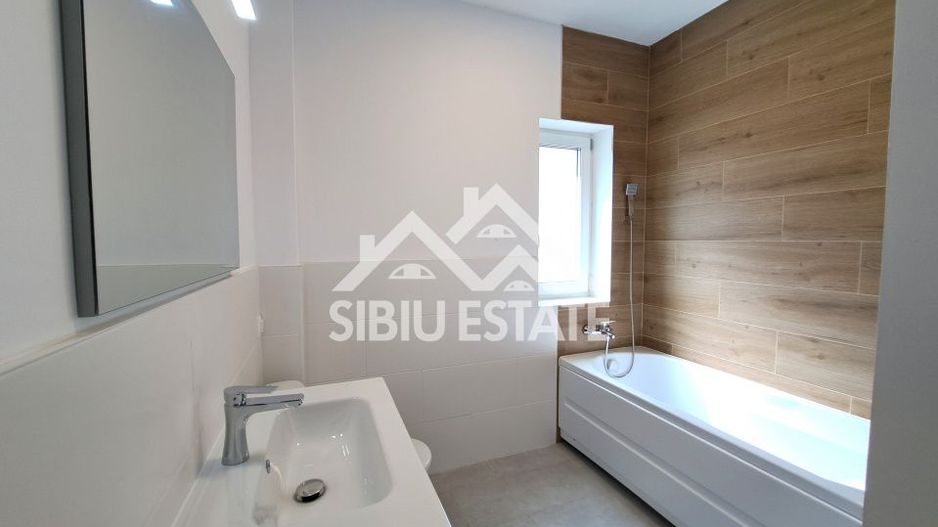 Apartament 61 mp modern finisat la cheie, gradina si terasa Selimbar - Poză 4