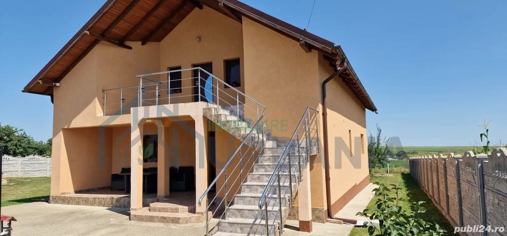 Casă cu mansardă - Poză 1