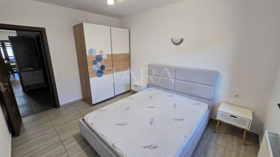 Apartament cu 3 camere si gradina, zona centrala a localitatii - Poză 2