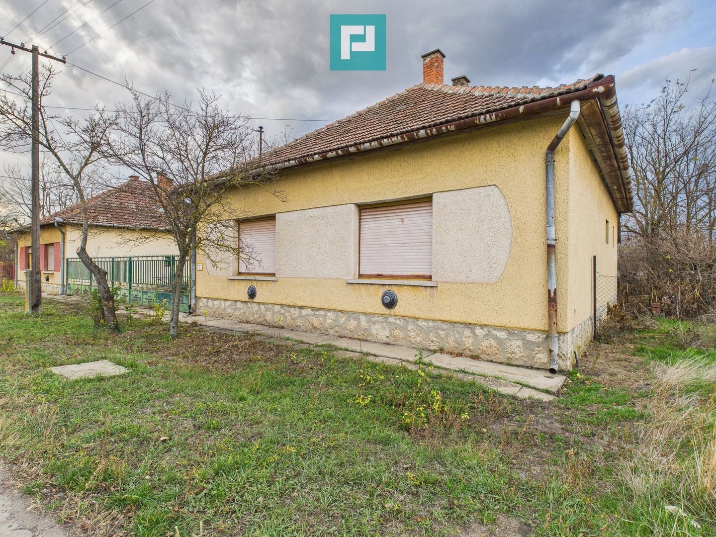 Casă cu 3 camere și potențial în Nagybanhegyes - Poză 1