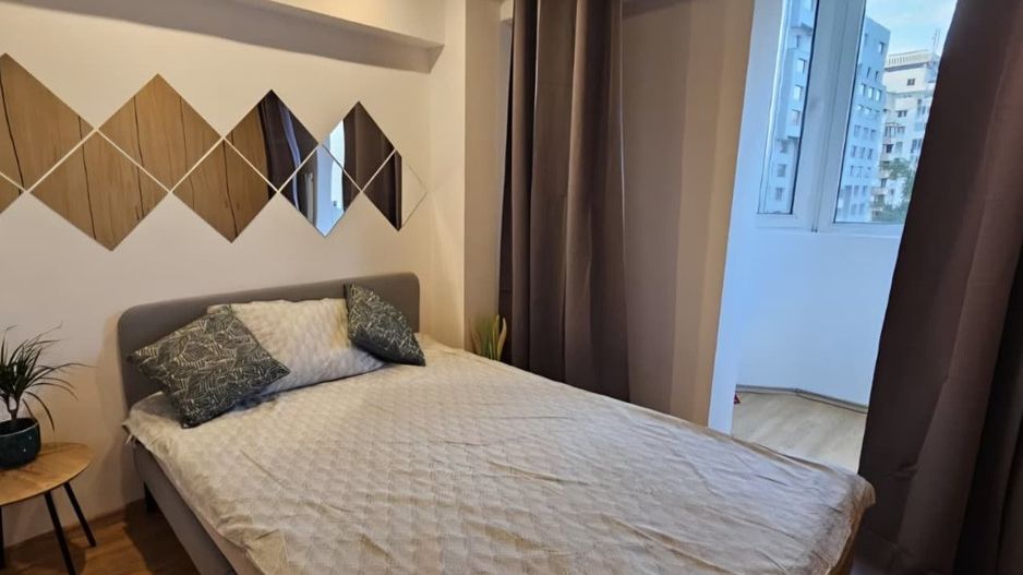 Închiriere 2 Camere Unirii, Decomandat Bloc Reabilitat - Poză 1