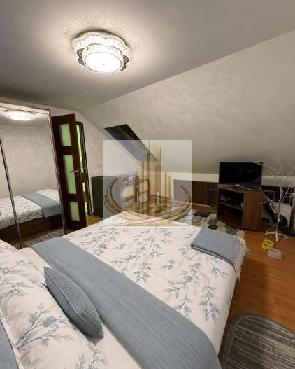 Se vinde apartament ( mansarda), 3 camere  74mp - Poză 2