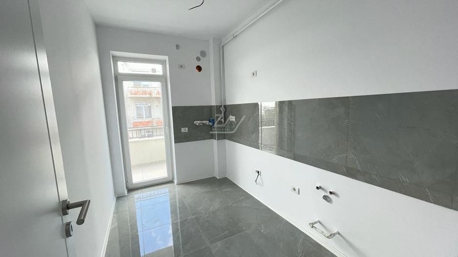 Bucatarie inchisa. Loc de parcare. - Poză 2