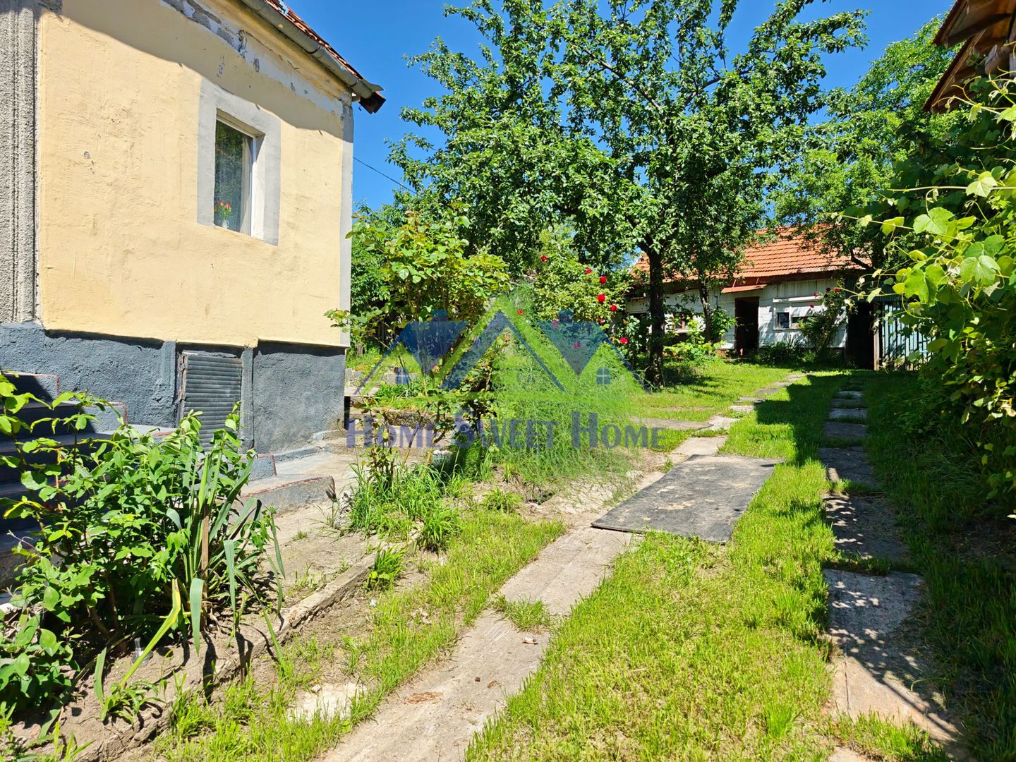 Casa Ghelari, 3 camere, 678mp, baie, buc., termopane, curte si gradina - Poză 2