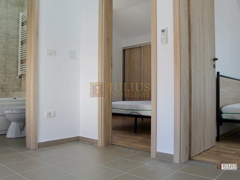 2 dormitoare, 80 mp utili, gradina si curte proprie de 300mp. - Poză 7