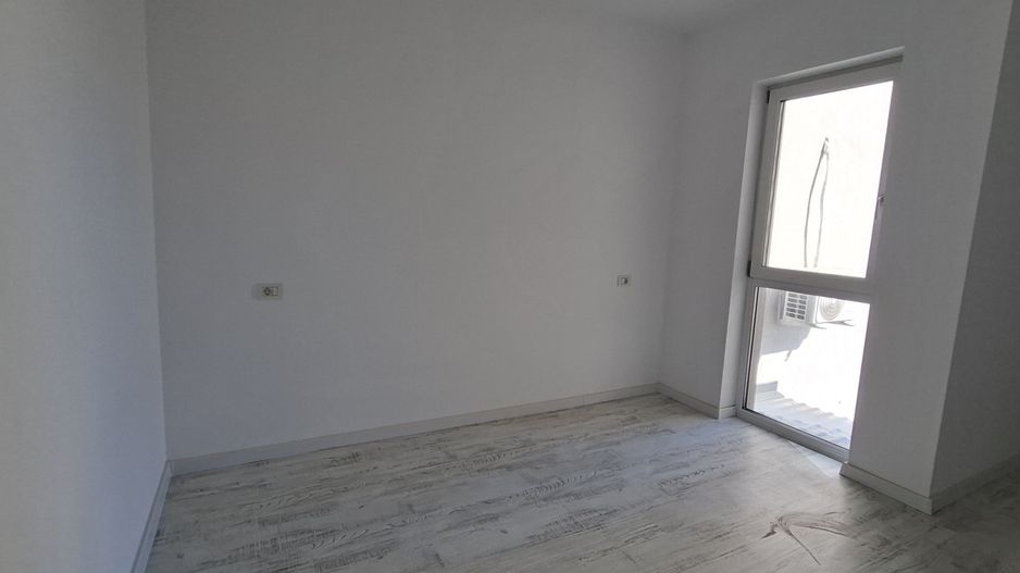 Apartament cu 3 camere si un loc de parcare - Poză 10