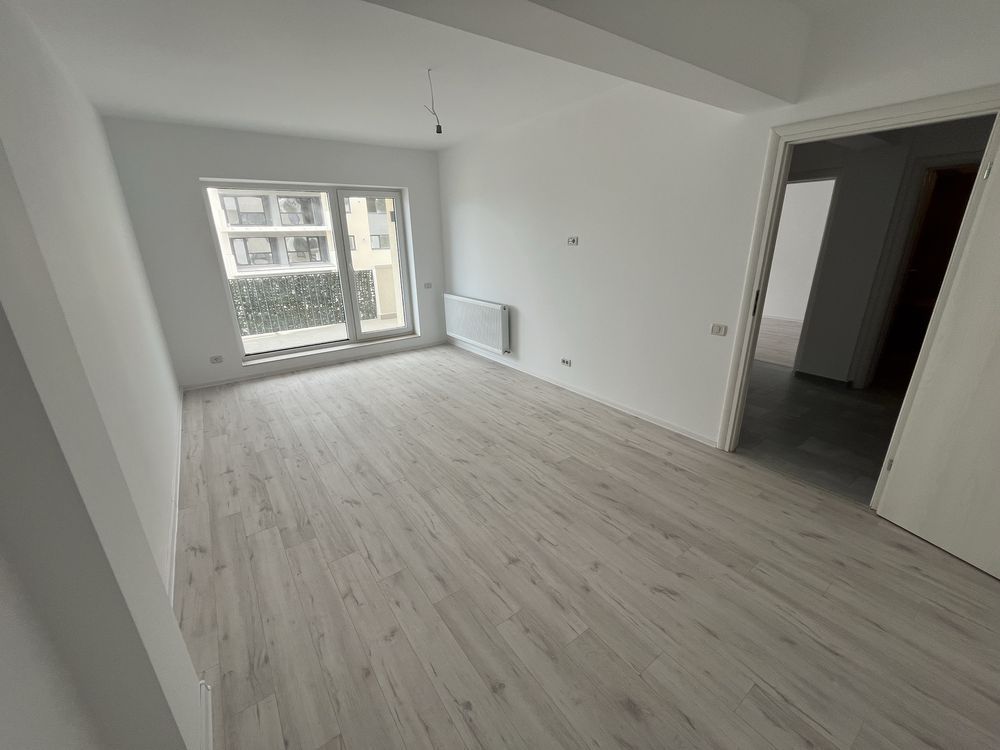 Apartament 2 camere+bucatarie separat+baie,hol si terasa+parcare - Poză 1
