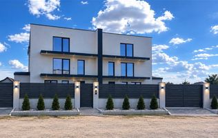 Casă pretabilă pentru 2 familii cu teren 434 mp.