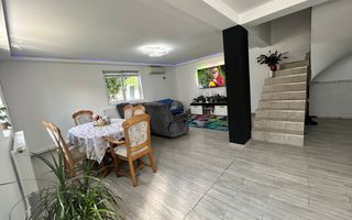 Casă P+1E cu terasă circulabilă, garaj amenajat și finisaje moderne - Poză 6