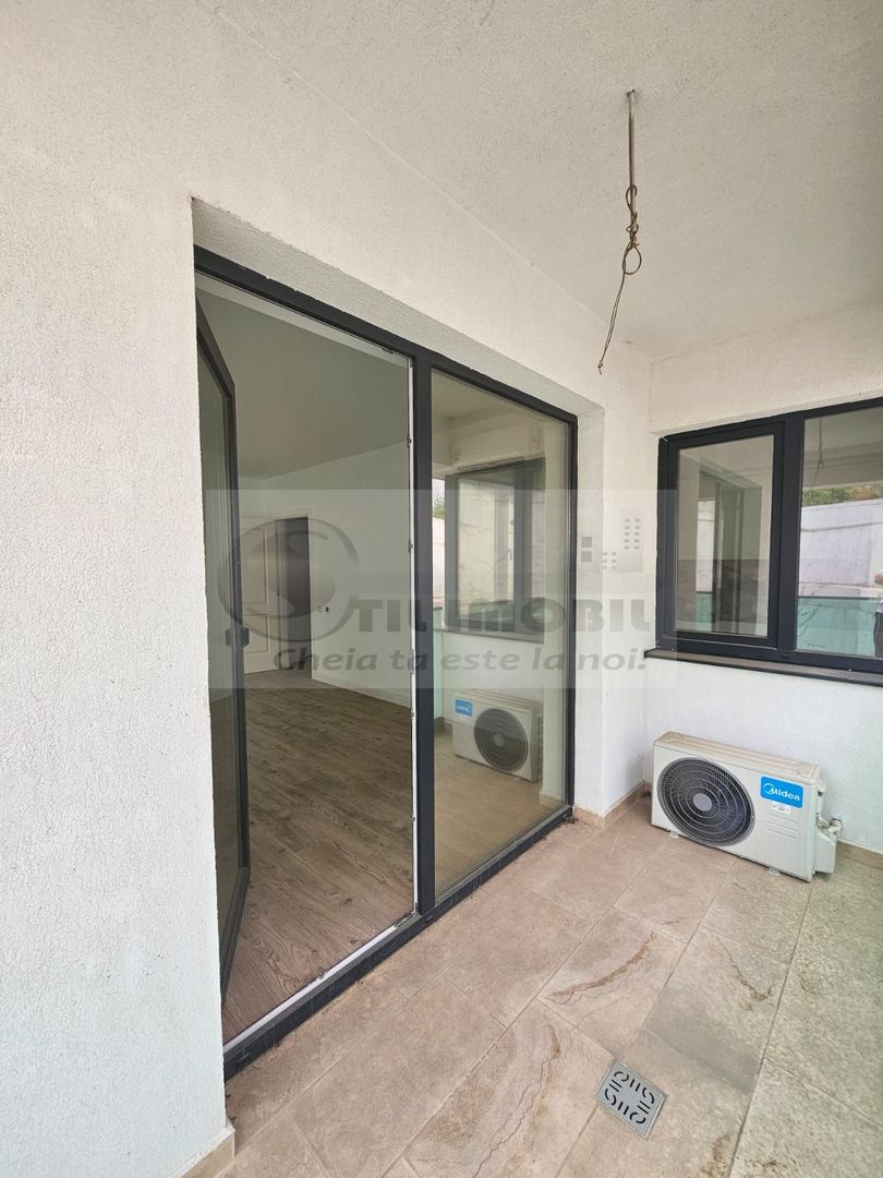 Apartament cu 2 camere decomandat Pacurari 65mp - parcare subterana - Poză 10