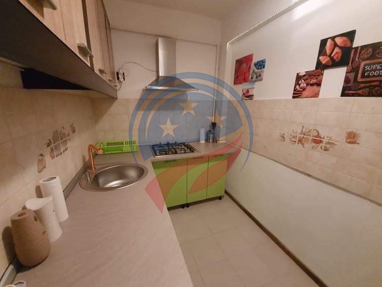 Garsonieră de închiriat Craiova centru, 24 mp, mobilată, aer condiționat - Poză 7