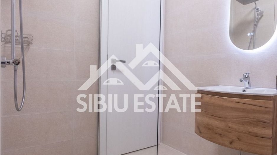 Casa moderna,de inchiriat,cu 4 camere, 3 bai-prima inchiriere Cisnadie - Poză 11