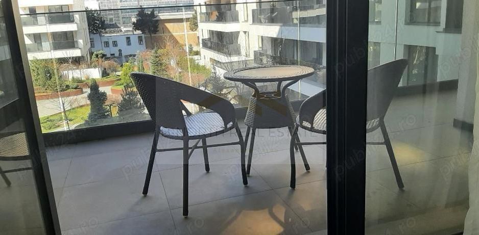 Apartament de închiriat 2 camere Nusco City Pipera | Vedere către grădina - Poză 10