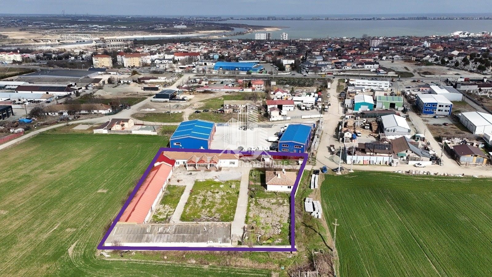 ​Oportunitate Investiție Ovidiu: Teren 4455 mp și Clădiri 1067 mp - Poză 1